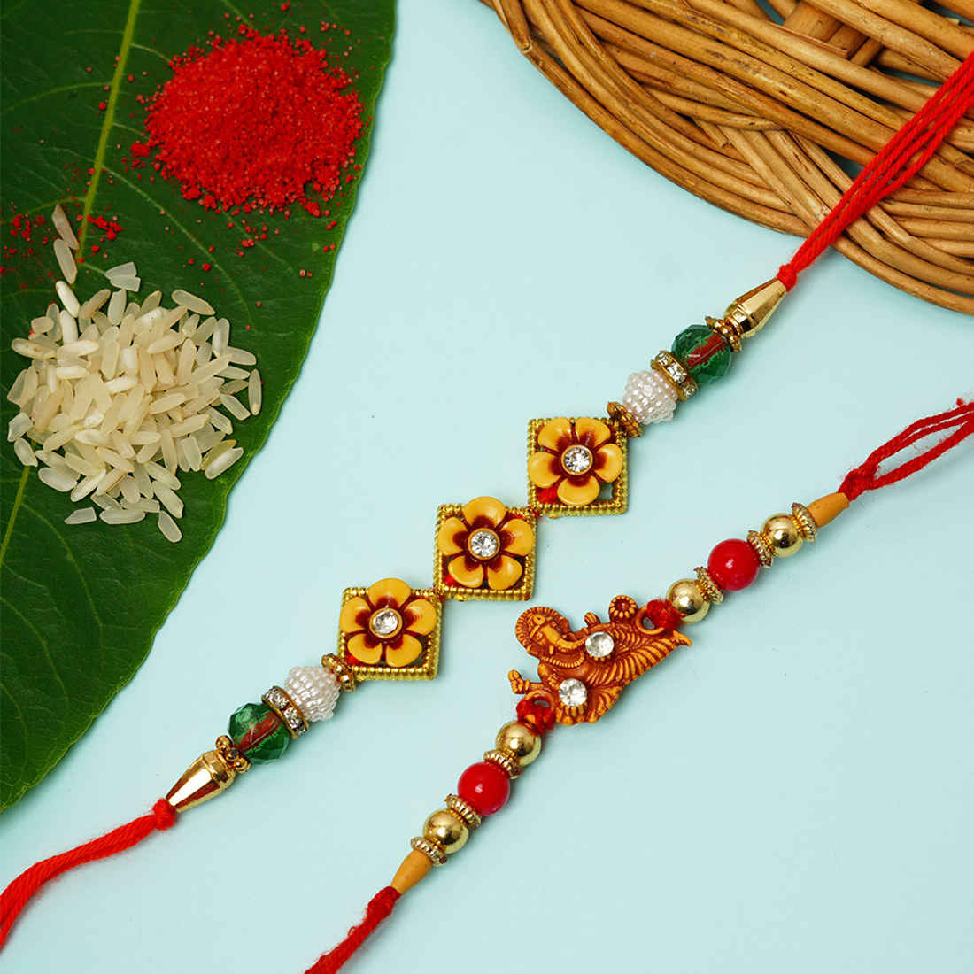 Shri Ganesh & Flower Meenakari Rakhi Set of 2