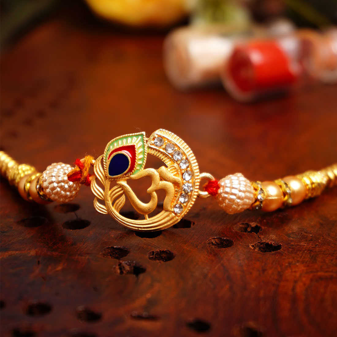 Urmika Golden Radha Krishna rakhi with Roli Chawal