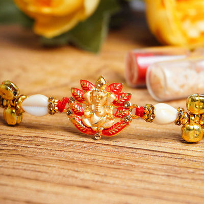 Urmika Red Color Ganesha Rakhi with Roli Chawal