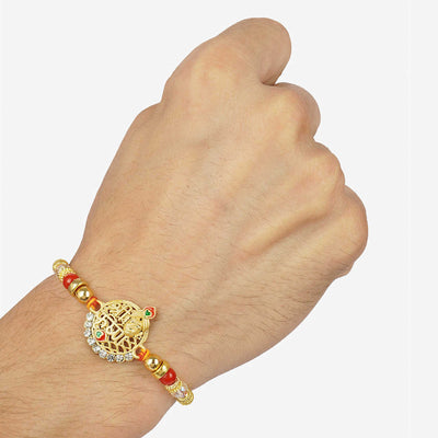 Urmika Shri Krishna Golden Color Rakhi with Roli Chawal