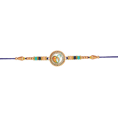 Urmika Peacock Rakhi with Blue Thread with Roli Chawal