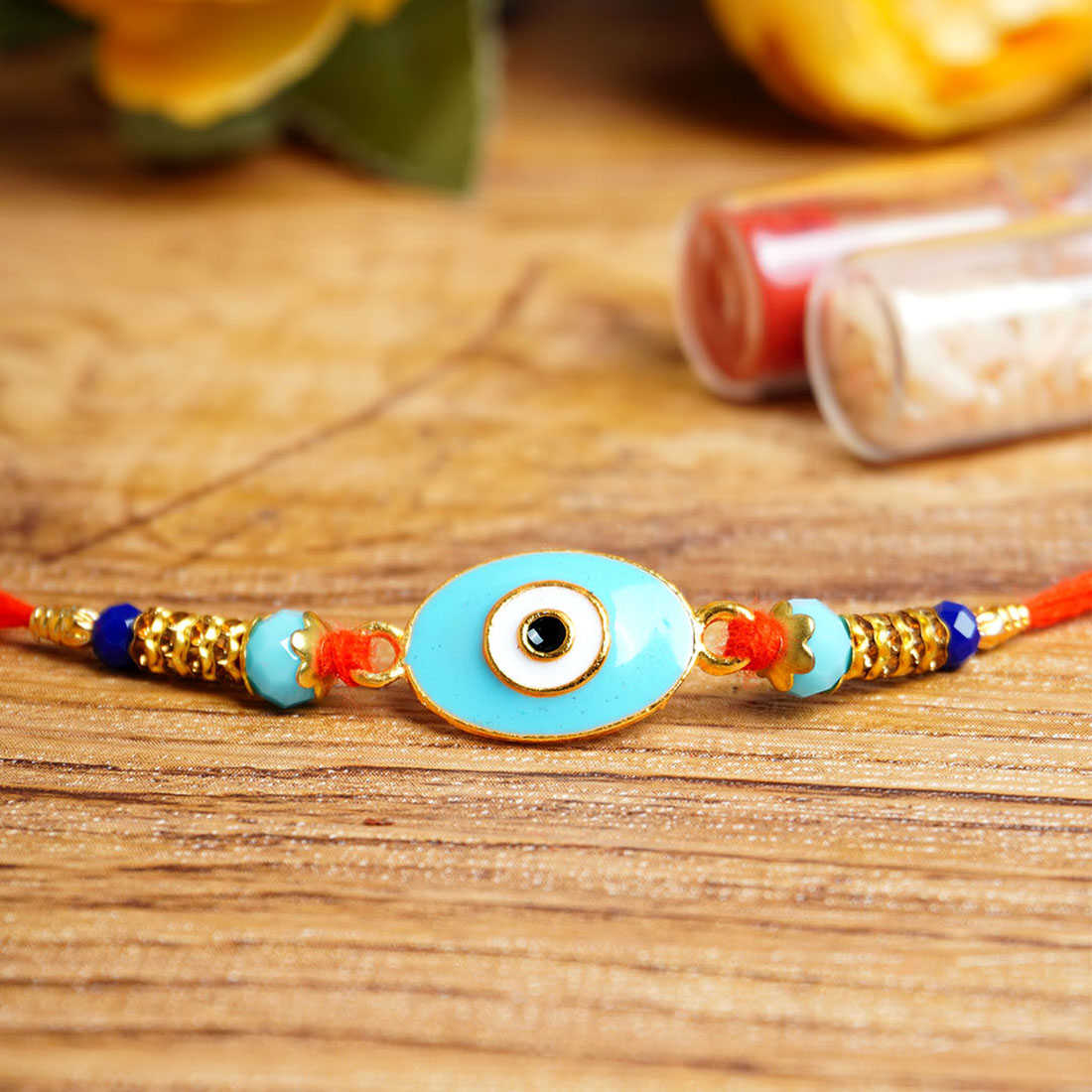 Ferosh Light Blue Evil Eye Rakhi with Roli Chawal