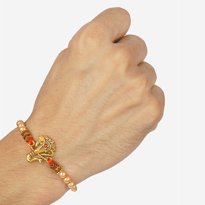 Urmika Shree Krishna and Ganesha Rakhi Set of 2 with Roli Chawal