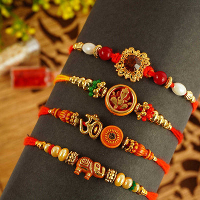 Urmika Designer Rakhi Set of 4 with Roli Chawal