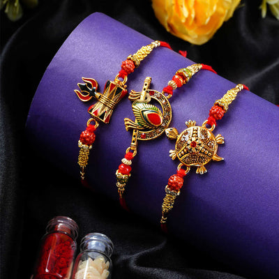 Urmika Shiv Damru, Flute and Tortoise Rakhi Set of 3 with Roli Chawal