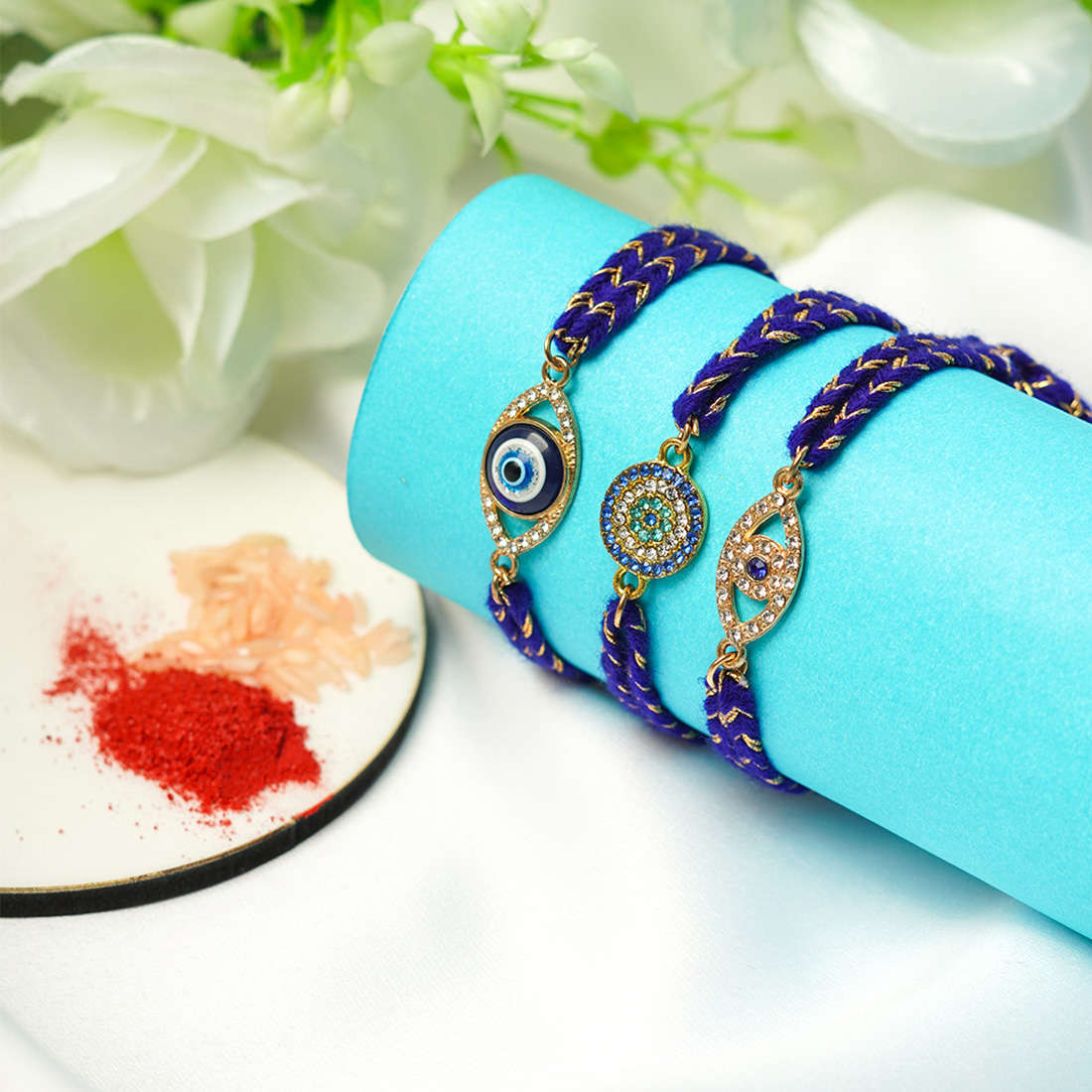 Blue Green Crystal Evil Eye Rakhi Set of 3