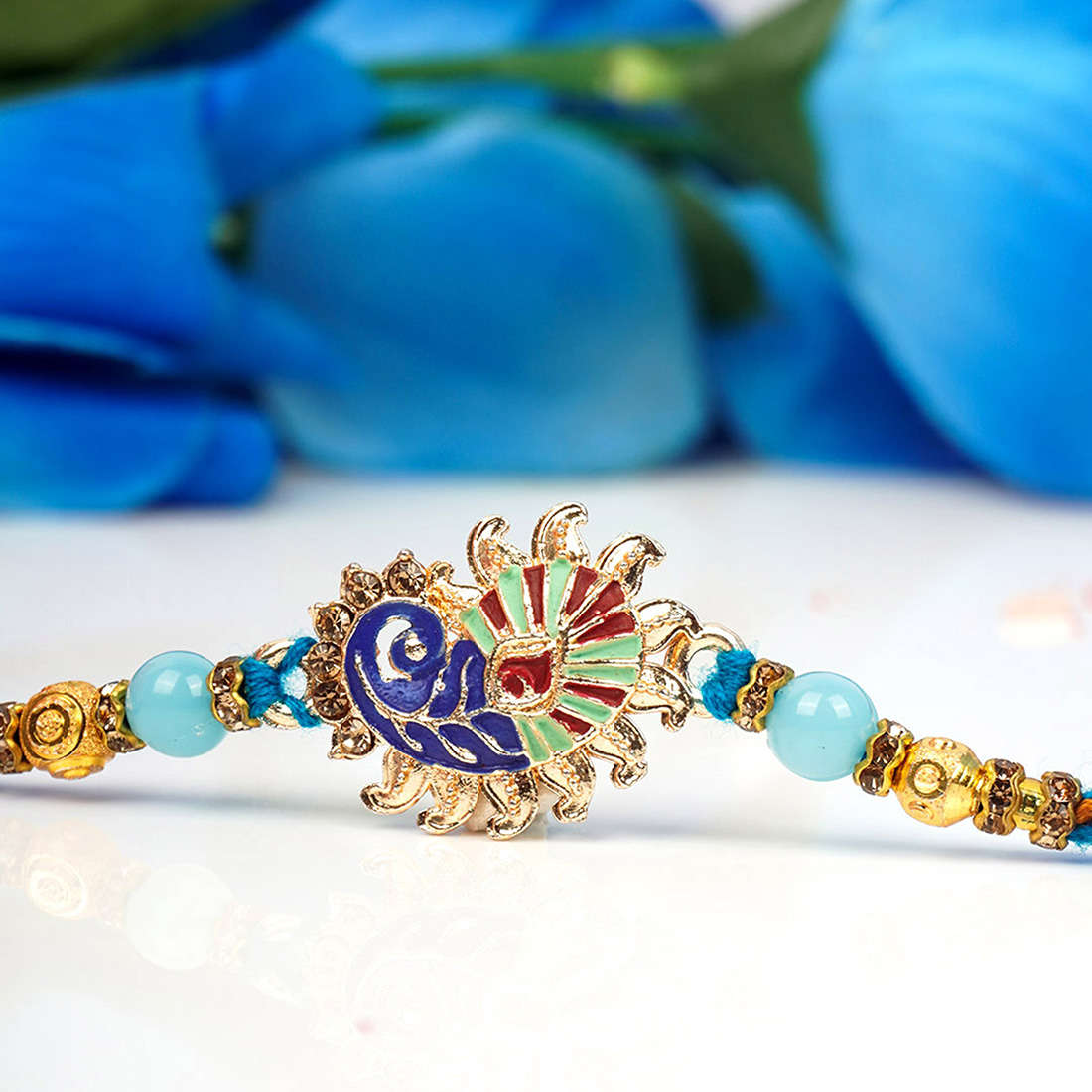 Blue Peacock Feather Rakhi