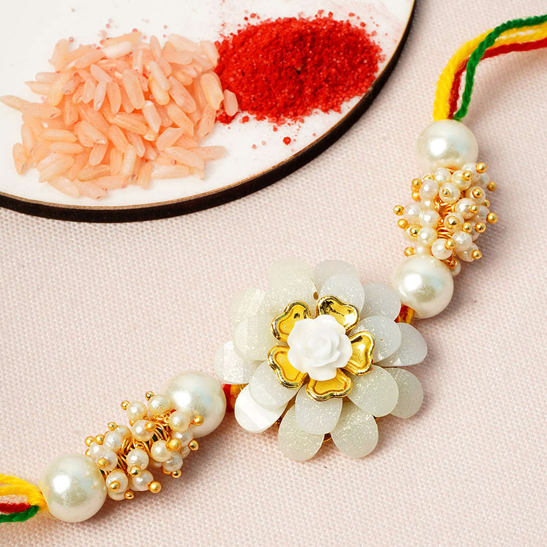 Crystal Centered White Rose Red Thread Rakhi