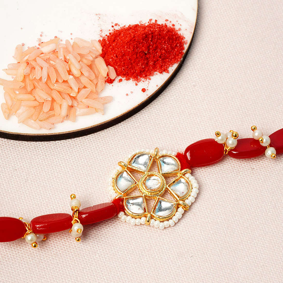 Crystal Flower Red Stone Rakhi