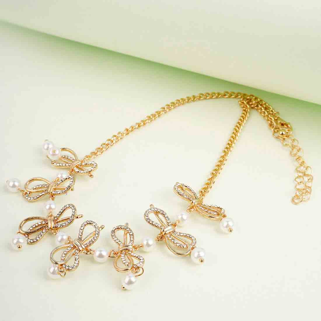 Crystal Studded Bow Gold Statement Necklace
