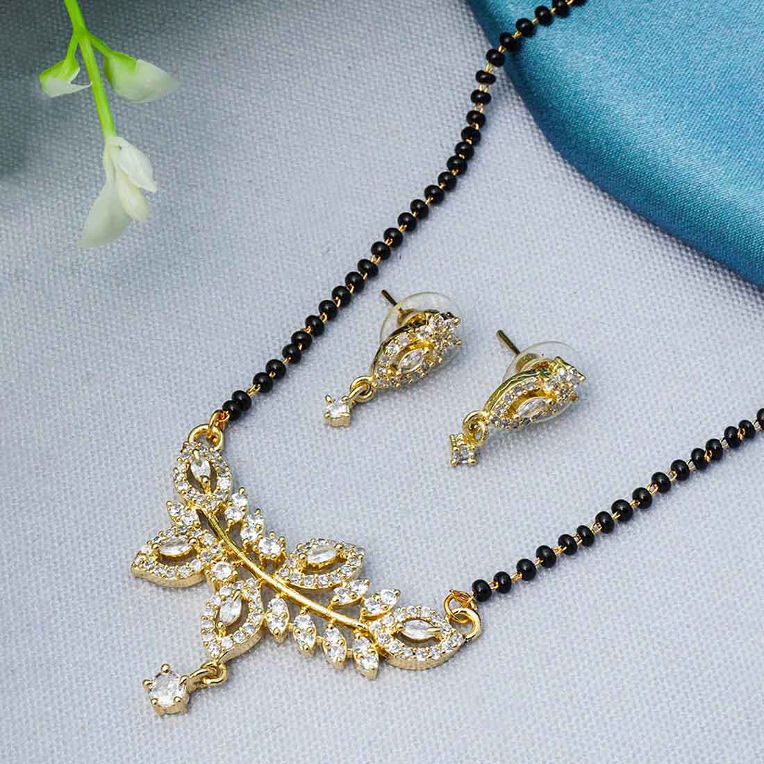 Gold Plated Black Beaded White AD Studded Mangalsutra With Earring sets