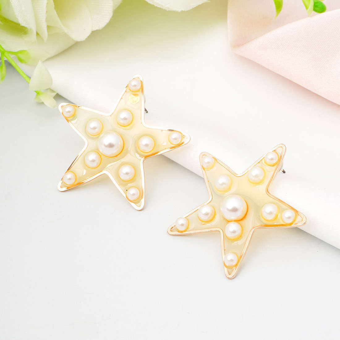Golden Pearl Star Studs
