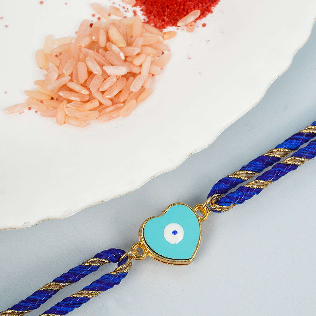 Light Blue Heart Evil Eye Rakhi