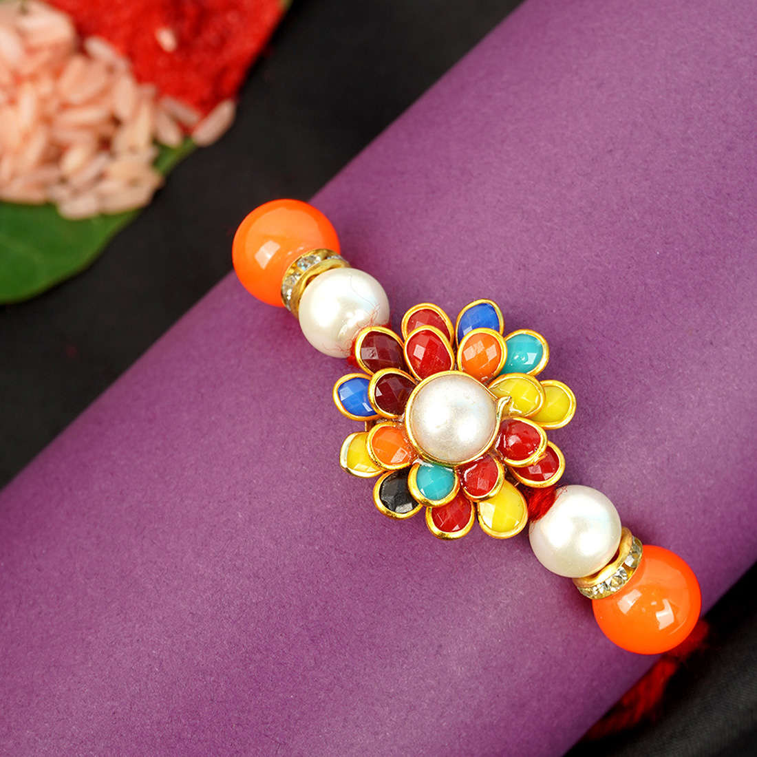 Multi-Colored Orange Bead Floral Thread Rakhi