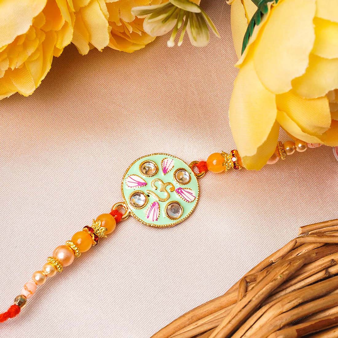 Om Mint Green Crystal Rakhi