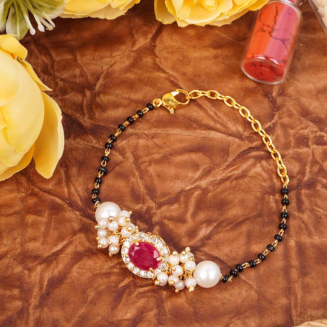 Red Stone Kundan Pearl Rakhi Bracelet