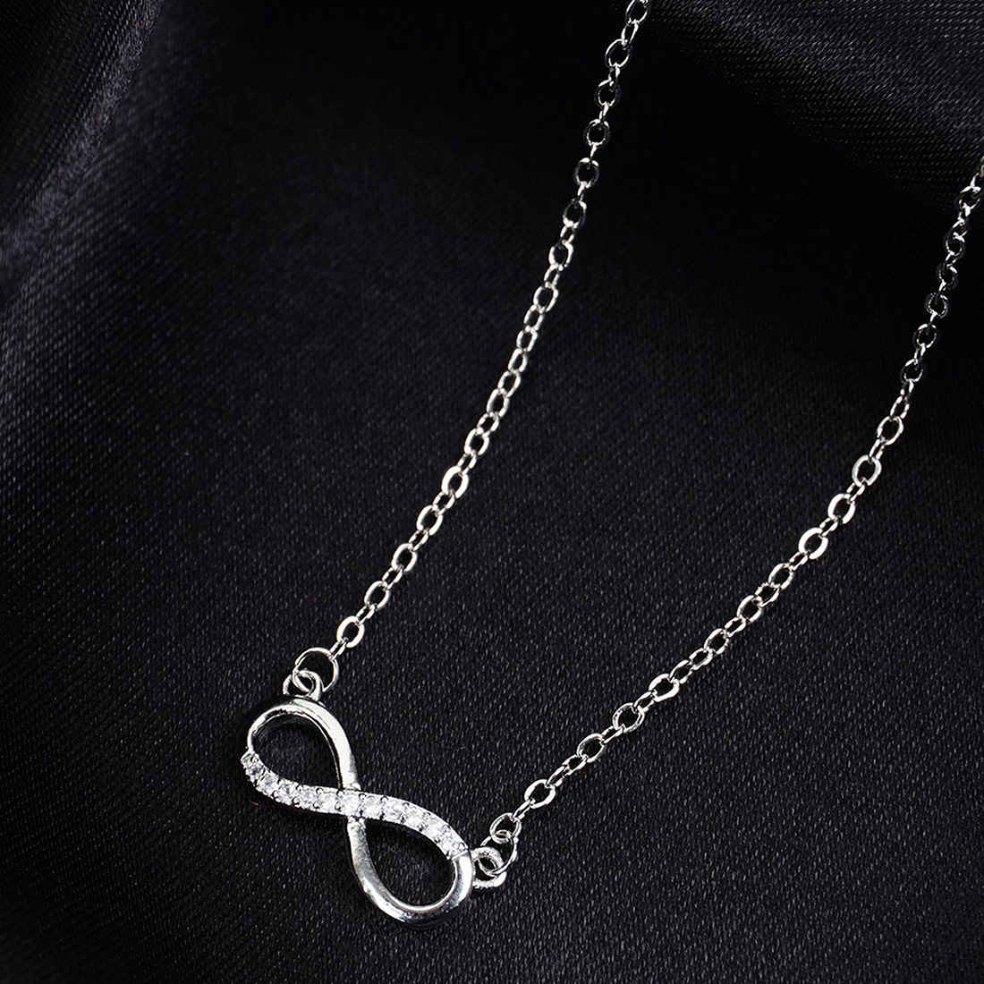 Silver Toned Delicate Crystal Infinity Necklace
