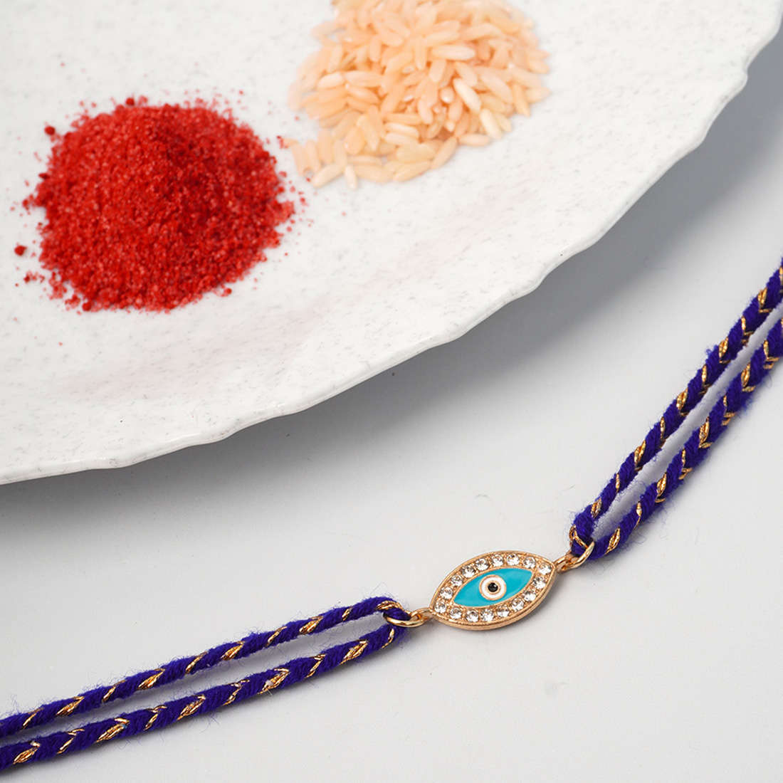 Turquoise Crystal Evil Eye Rakhi