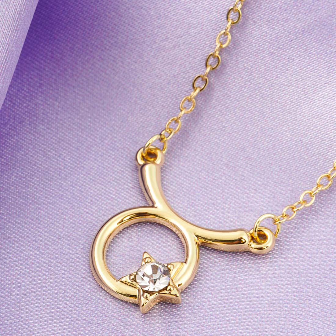 Women Gold-Toned & Stone-Studded Crystal Star Taurus Pendant With Chain