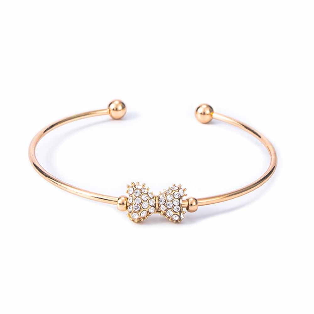 Zela Rhinestone Bow Golden Cuff Bracelet